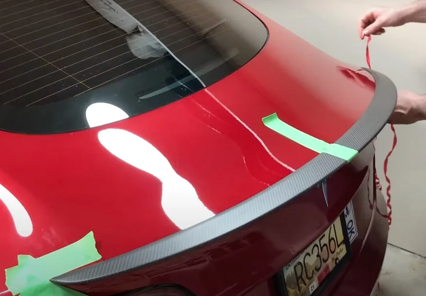 Model 3 spoiler installation - Peeling adhesive tape